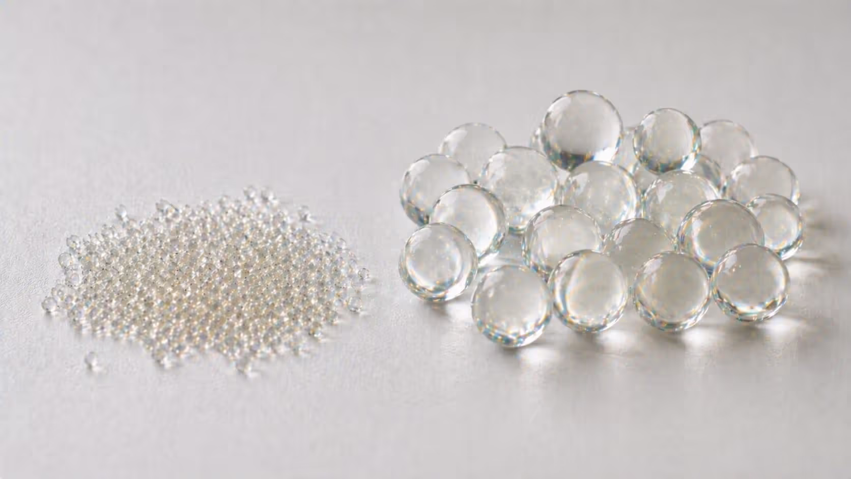 Dry and hydrated gel beads showing size and texture difference