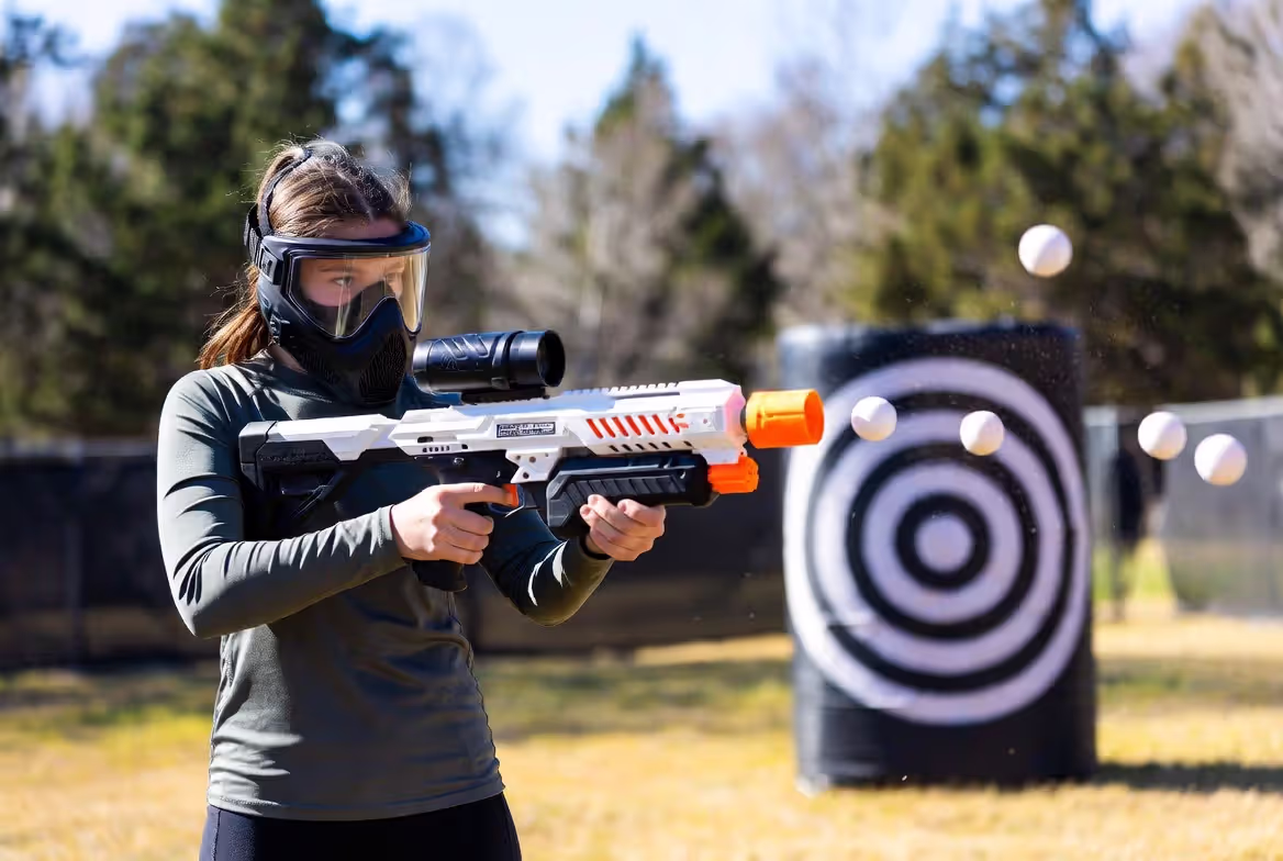 shooting gel blaster at target showing firing action