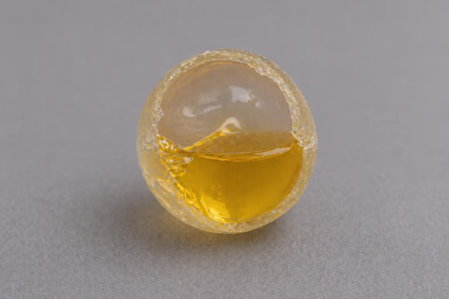 cross section of paintball showing gelatin shell and liquid fill