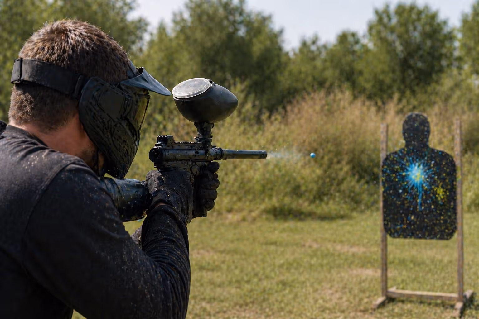 paintball marker firing shot showing muzzle action