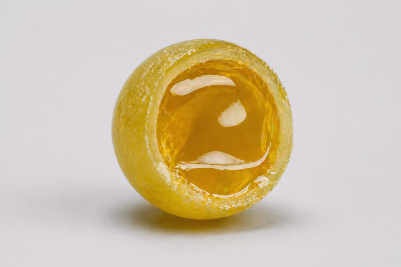 cross section of paintball showing gelatin shell and liquid fill