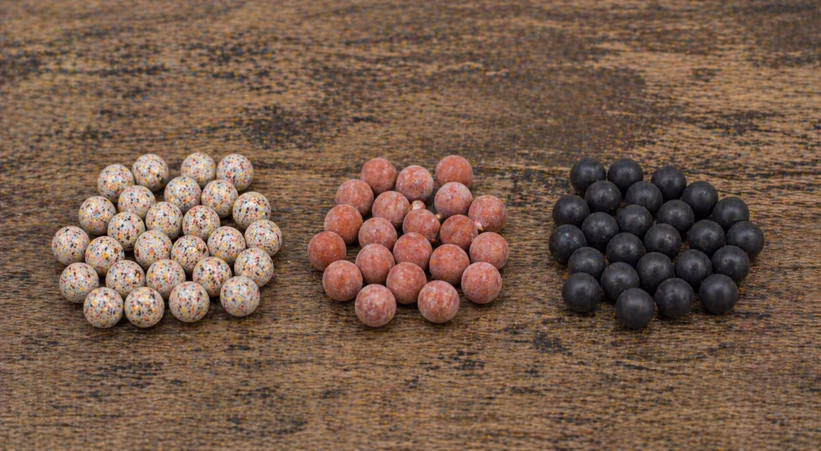 different types of less lethal paintball ammo including pepper training and rubber balls