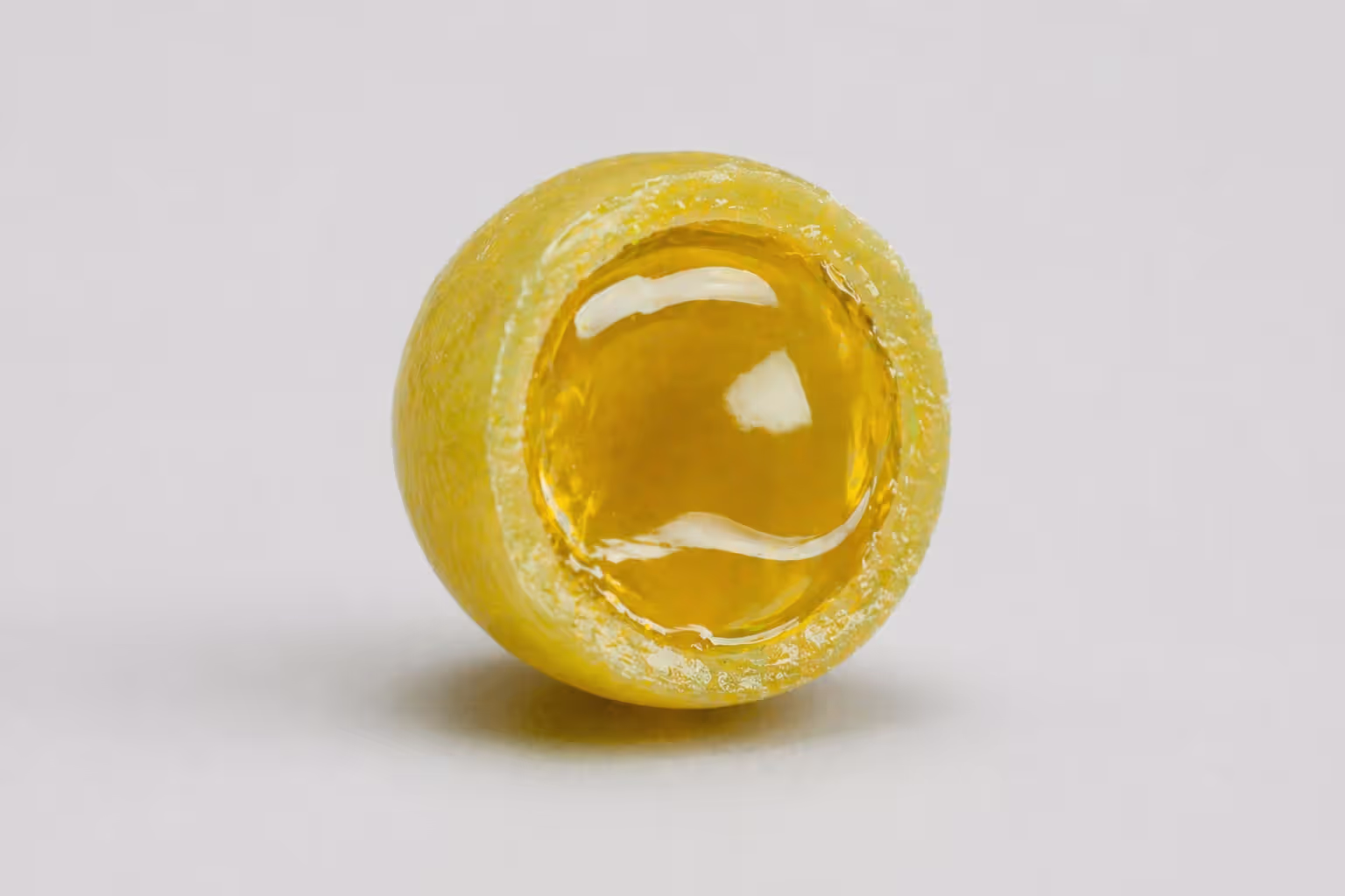 cross section of paintball showing gelatin shell and liquid fill