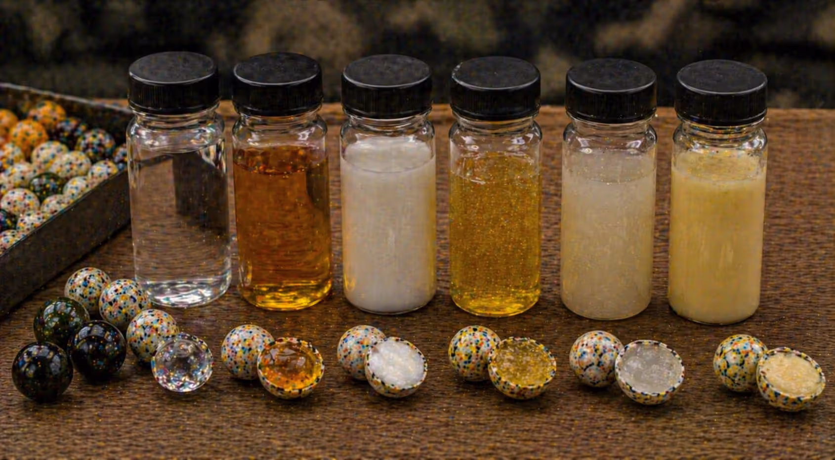 different paintball fill liquids showing viscosity differences
